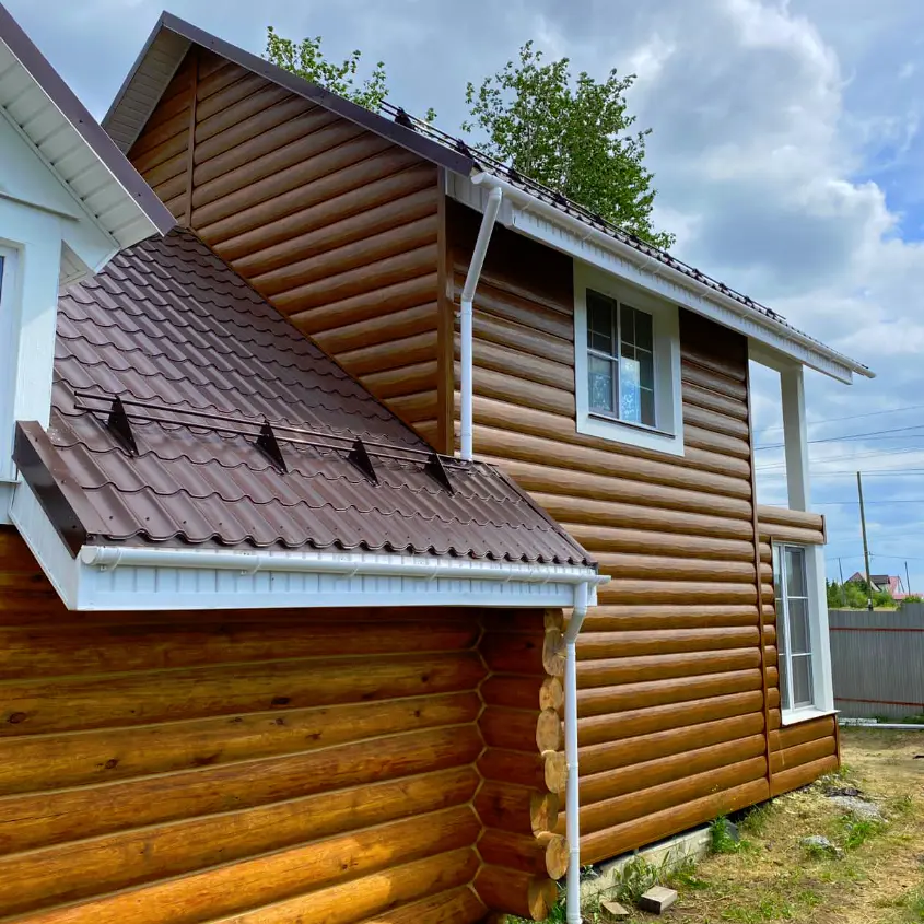 Фото 3 фасад из металлосайдинга Бревно Рубленое 4D Орех 3D Printech